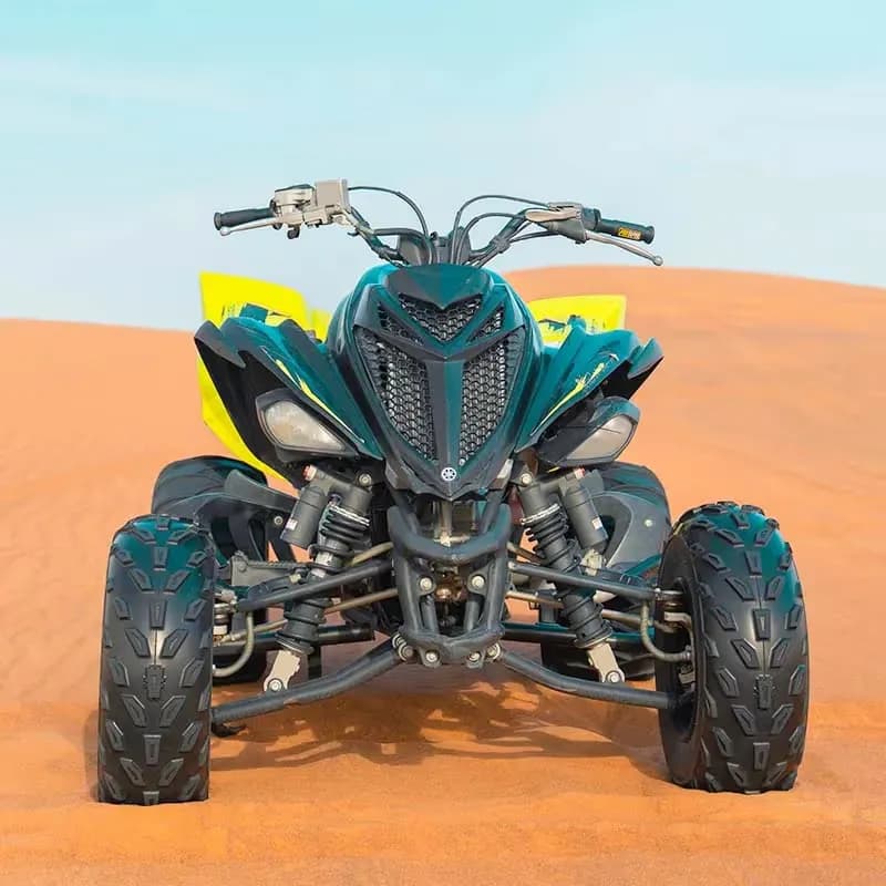 Yamaha Raptor 700 manual sport quad on the Dubai dunes، صورة 5
